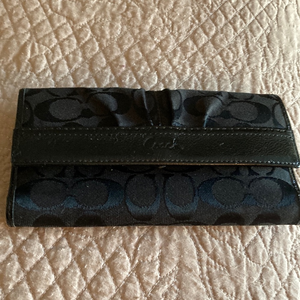 Black leather/ Patent leather wallet.  Back zipper pocket large card holders